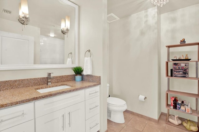 1238 E Kennedy Blvd Unit 702, Tampa, FL 33602 - full bath with vanity, tile patterned flooring, toilet, and baseboards