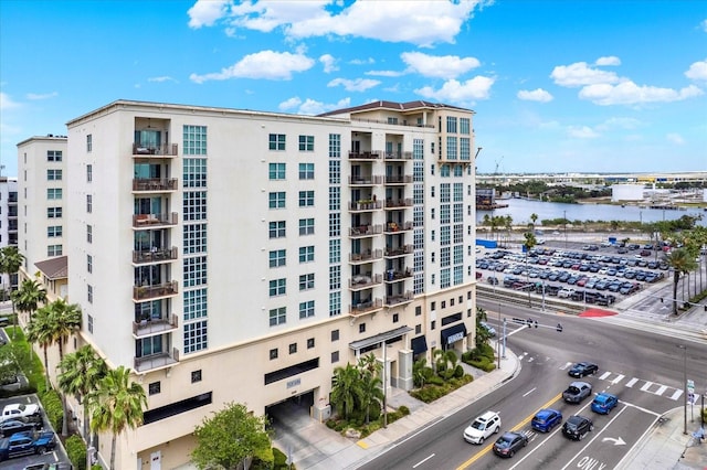 1238 E Kennedy Blvd Unit 702, Tampa, FL 33602 - view of apartment building / complex featuring uncovered parking