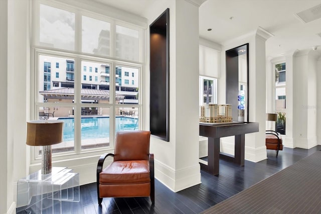 1238 E Kennedy Blvd Unit 702, Tampa, FL 33602 - living area featuring baseboards and dark wood finished floors