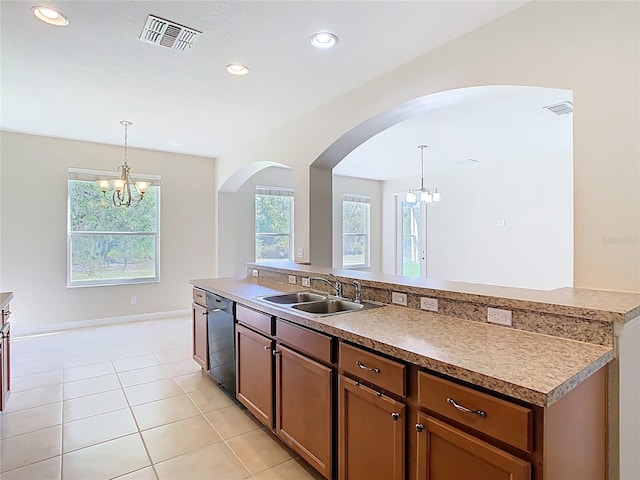1705 Plantation Pointe Dr, Orlando, FL 32824 - kitchen with a chandelier, arched walkways, hanging light fixtures, dishwasher, and recessed lighting