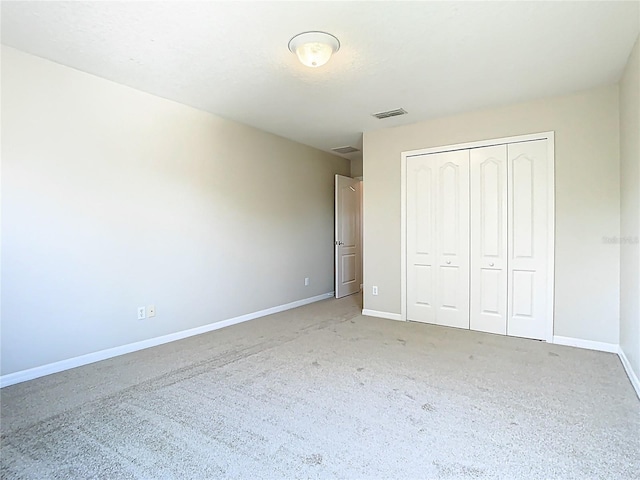1705 Plantation Pointe Dr, Orlando, FL 32824 - unfurnished bedroom with carpet flooring and a closet