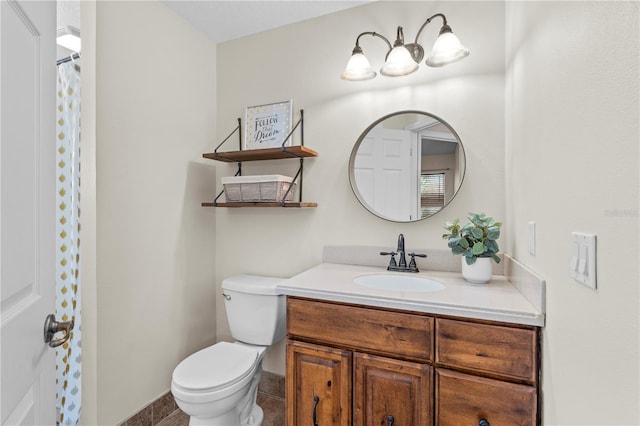 full bathroom featuring toilet, baseboards, tile patterned flooring, and vanity