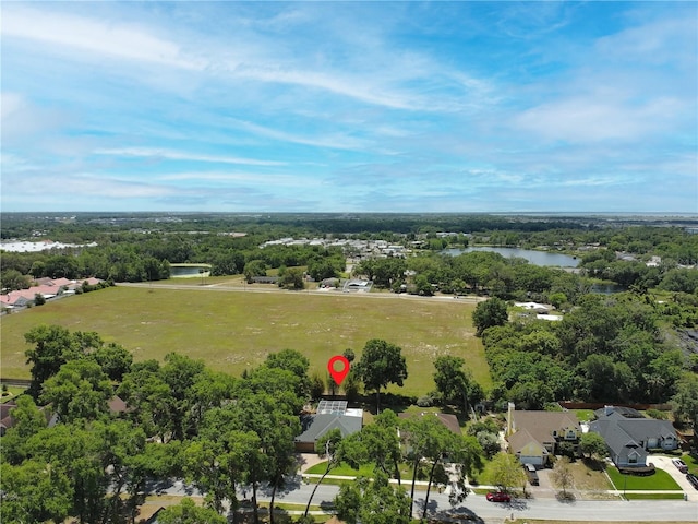 aerial view with a water view and a residential view
