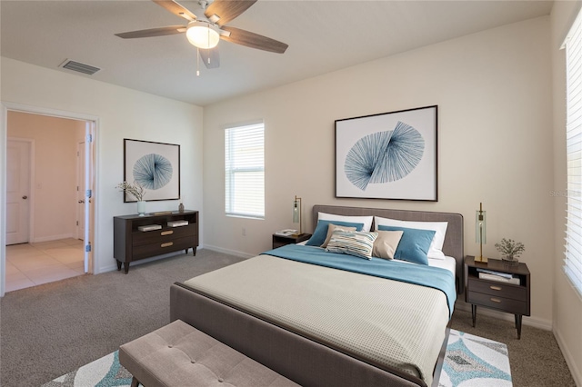 16810 Trite Bend St, Wimauma, FL 33598 - bedroom with carpet flooring, baseboards, and a ceiling fan
