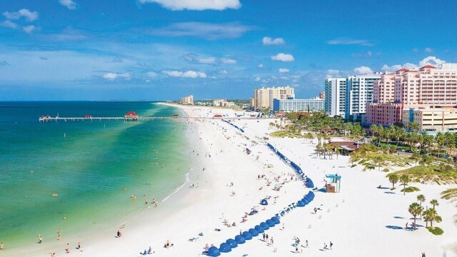 333 Island Way Unit 203, Clearwater Beach, FL 33767 - bird's eye view featuring a beach view and a water view