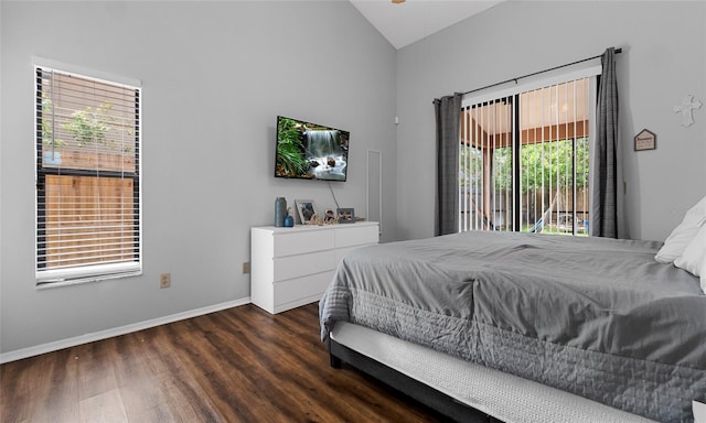 bedroom featuring access to exterior, wood finished floors, baseboards, and high vaulted ceiling
