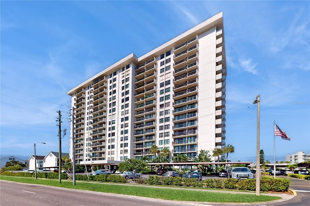 400 Island Way Unit 210, Clearwater Beach, FL 33767 - view of building exterior with parking