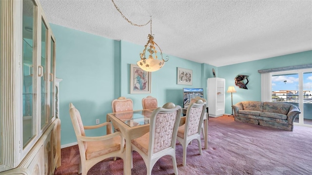 17400 Gulf Blvd Unit I4, North Redington Beach, FL 33708 - dining space featuring carpet floors and a textured ceiling