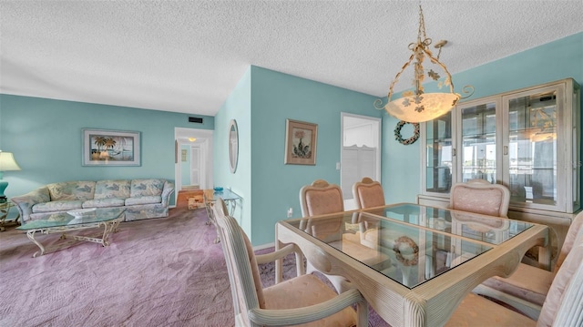 17400 Gulf Blvd Unit I4, North Redington Beach, FL 33708 - carpeted dining area featuring a textured ceiling and visible vents