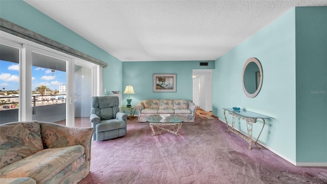 17400 Gulf Blvd Unit I4, North Redington Beach, FL 33708 - carpeted living room with a textured ceiling, baseboards, and visible vents