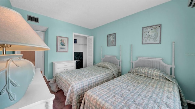 17400 Gulf Blvd Unit I4, North Redington Beach, FL 33708 - carpeted bedroom featuring baseboards and visible vents