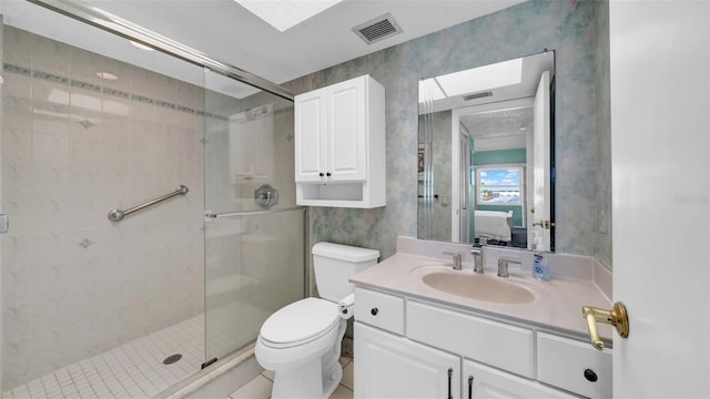 17400 Gulf Blvd Unit I4, North Redington Beach, FL 33708 - bathroom featuring visible vents, toilet, vanity, ensuite bath, and a stall shower