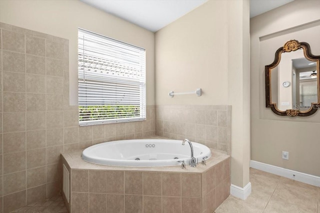 bathroom with tile patterned floors and a whirlpool tub