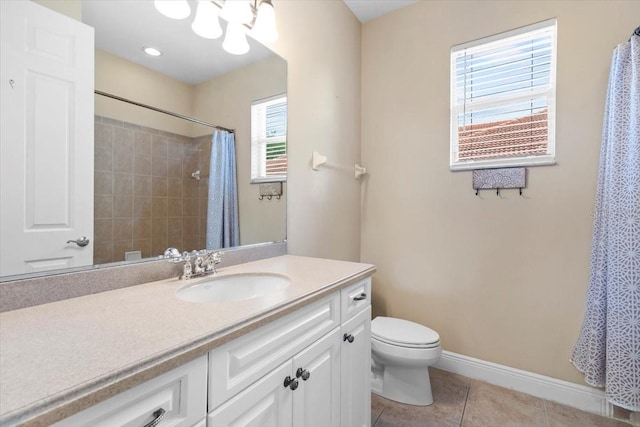 full bath featuring a shower with curtain, toilet, baseboards, tile patterned flooring, and vanity