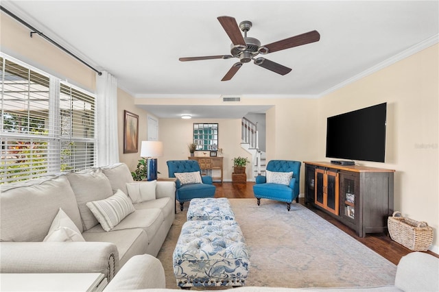 2525 Madrid Way S, Saint Petersburg, FL 33712 - living room with wood finished floors, stairs, and ornamental molding