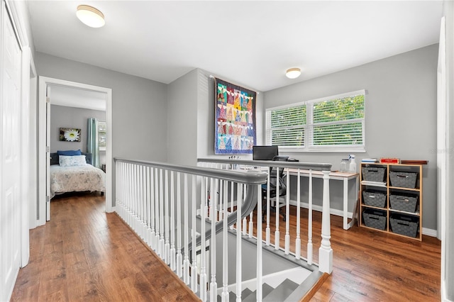2525 Madrid Way S, Saint Petersburg, FL 33712 - hall featuring wood finished floors and an upstairs landing
