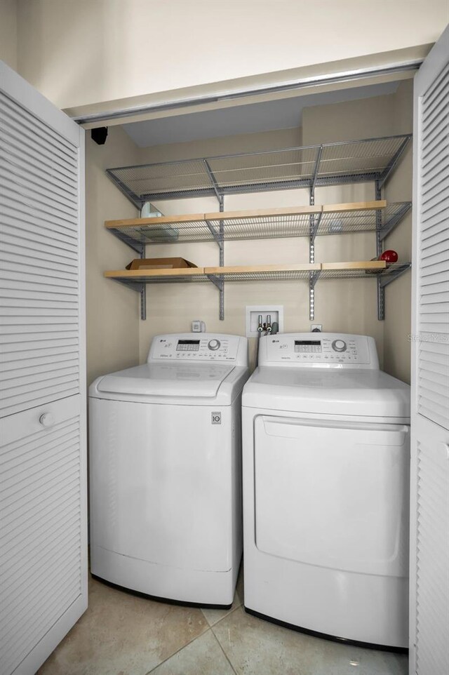 laundry room with independent washer and dryer and laundry area