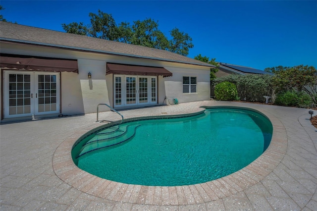 pool featuring a patio area and french doors