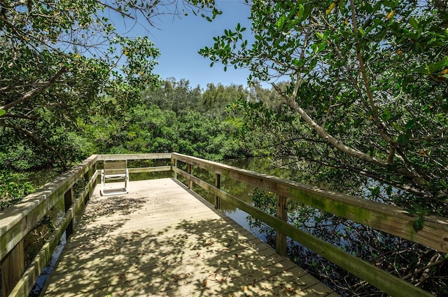 exterior space featuring a wooded view