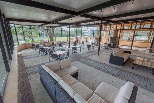 3119 Bent Creek Dr, Valrico, FL 33596 - community lobby with beamed ceiling and a sunroom