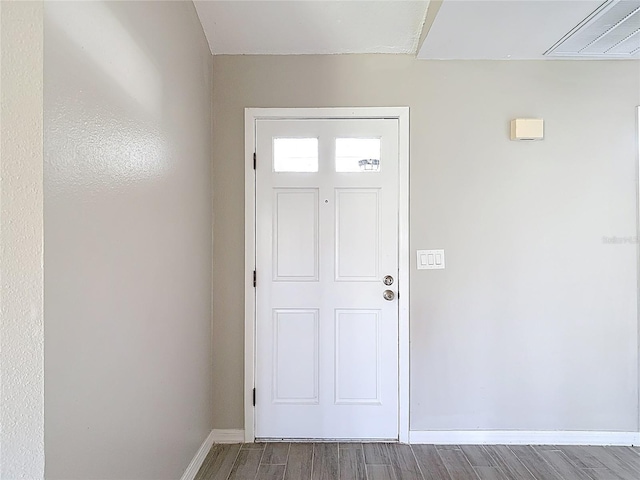 1530 High Knoll Dr, Brandon, FL 33511 - foyer entrance featuring wood finished floors and baseboards