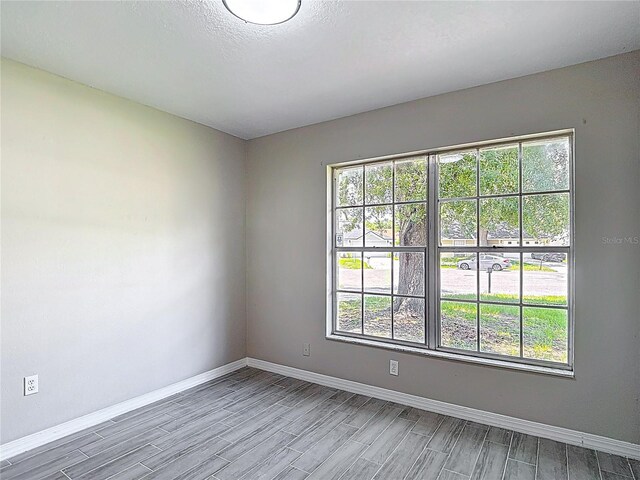 1530 High Knoll Dr, Brandon, FL 33511 - empty room with baseboards and wood finish floors