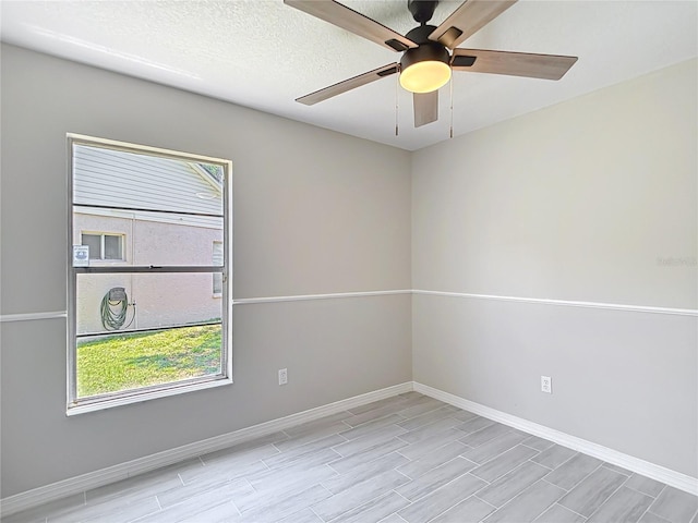 1530 High Knoll Dr, Brandon, FL 33511 - spare room featuring healthy amount of natural light, wood finished floors, and ceiling fan