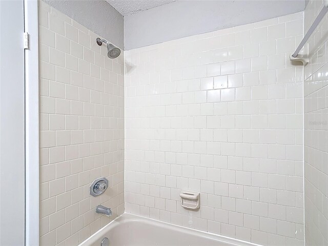 1530 High Knoll Dr, Brandon, FL 33511 - bathroom with shower / tub combination and a textured ceiling