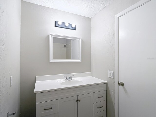 1530 High Knoll Dr, Brandon, FL 33511 - bathroom featuring vanity and a textured ceiling