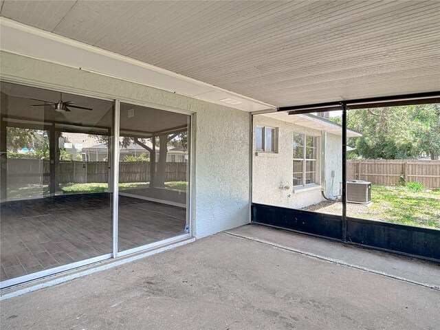 1530 High Knoll Dr, Brandon, FL 33511 - unfurnished sunroom featuring healthy amount of natural light and ceiling fan