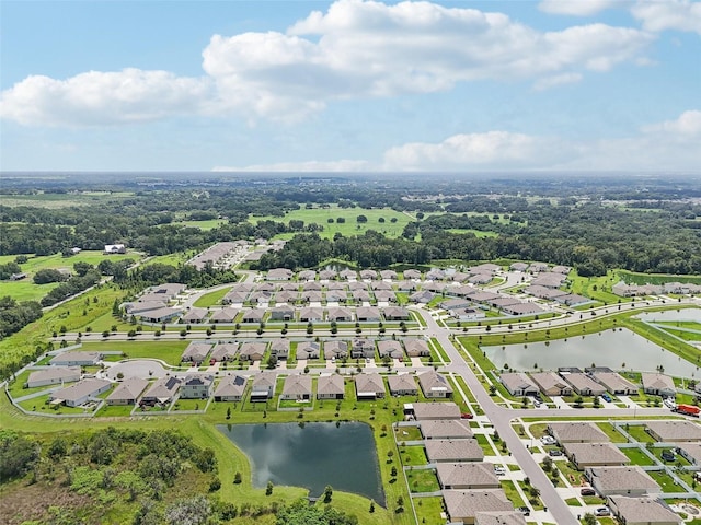 aerial view featuring a residential view and a water view