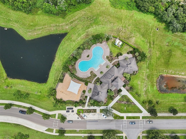 drone / aerial view with a water view