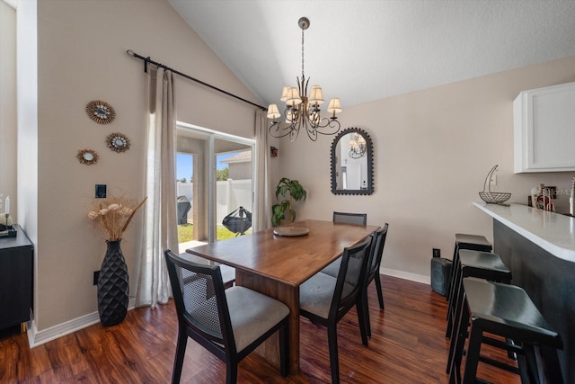 dining room featuring vaulted ceiling, baseboards, an inviting chandelier, and dark wood-style floors