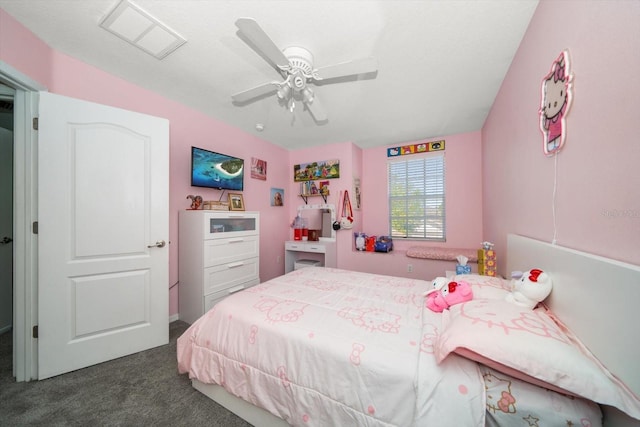 bedroom with carpet, visible vents, and ceiling fan