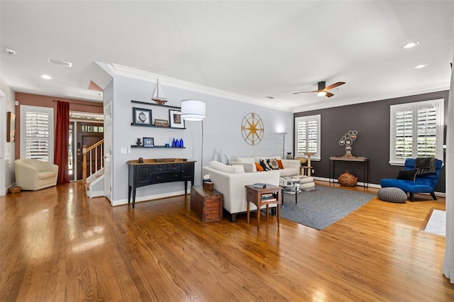 5902 Audubon Manor Blvd, Lithia, FL 33547 - living room featuring wood finished floors, a ceiling fan, stairway, ornamental molding, and recessed lighting