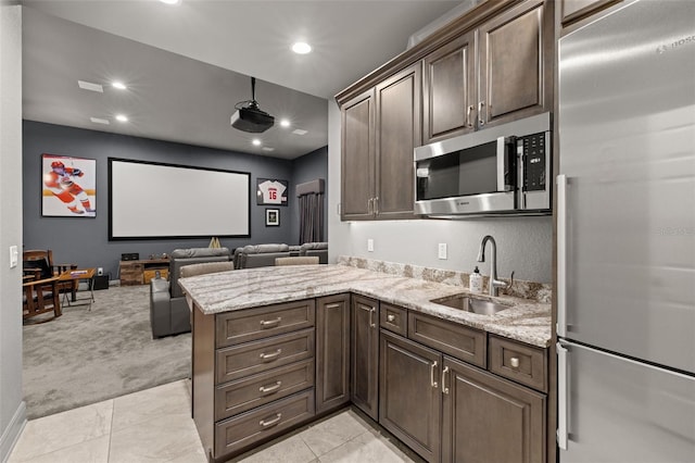 5902 Audubon Manor Blvd, Lithia, FL 33547 - home theater with a sink, recessed lighting, light carpet, and light tile patterned floors