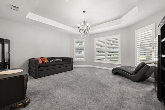 5902 Audubon Manor Blvd, Lithia, FL 33547 - sitting room featuring carpet, a chandelier, a tray ceiling, and baseboards