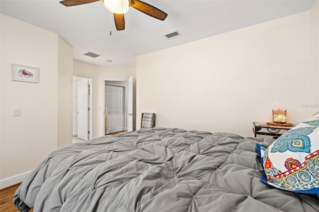 5902 Audubon Manor Blvd, Lithia, FL 33547 - bedroom with wood finished floors, baseboards, and ceiling fan