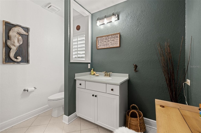 5902 Audubon Manor Blvd, Lithia, FL 33547 - bathroom with vanity, toilet, tile patterned floors, and baseboards
