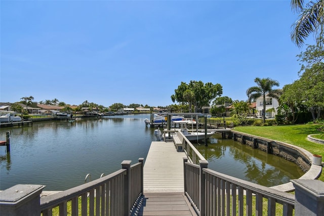 4226 Saltwater Blvd, Tampa, FL 33615 - view of dock with a yard and a water view