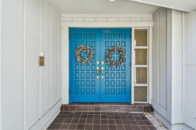 4226 Saltwater Blvd, Tampa, FL 33615 - property entrance with board and batten siding