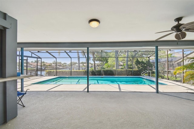 4226 Saltwater Blvd, Tampa, FL 33615 - pool featuring a patio, a water view, ceiling fan, and a lanai