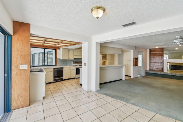 4226 Saltwater Blvd, Tampa, FL 33615 - kitchen with ceiling fan, visible vents, open floor plan, white electric range oven, and black dishwasher
