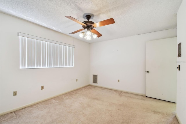 4226 Saltwater Blvd, Tampa, FL 33615 - carpeted spare room with ceiling fan, a textured ceiling, and visible vents