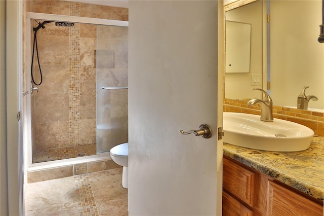 1915 Peppertree Dr, Oldsmar, FL 34677 - full bath with a stall shower, toilet, vanity, and decorative backsplash