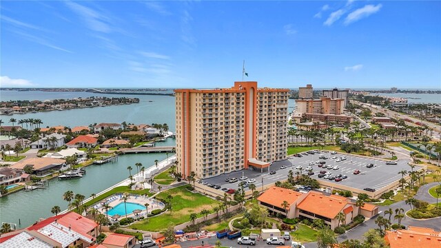birds eye view of property with a water view