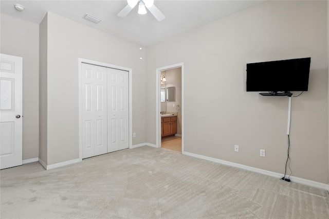 11716 Summer Springs Dr, Riverview, FL 33579 - unfurnished bedroom featuring light carpet, a closet, baseboards, and ensuite bathroom