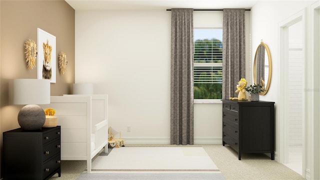 bedroom with baseboards and carpet flooring