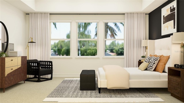 bedroom featuring carpet floors and multiple windows