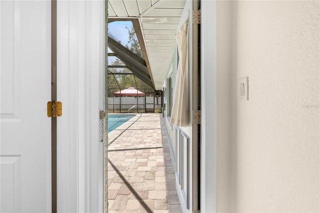 doorway featuring brick floor